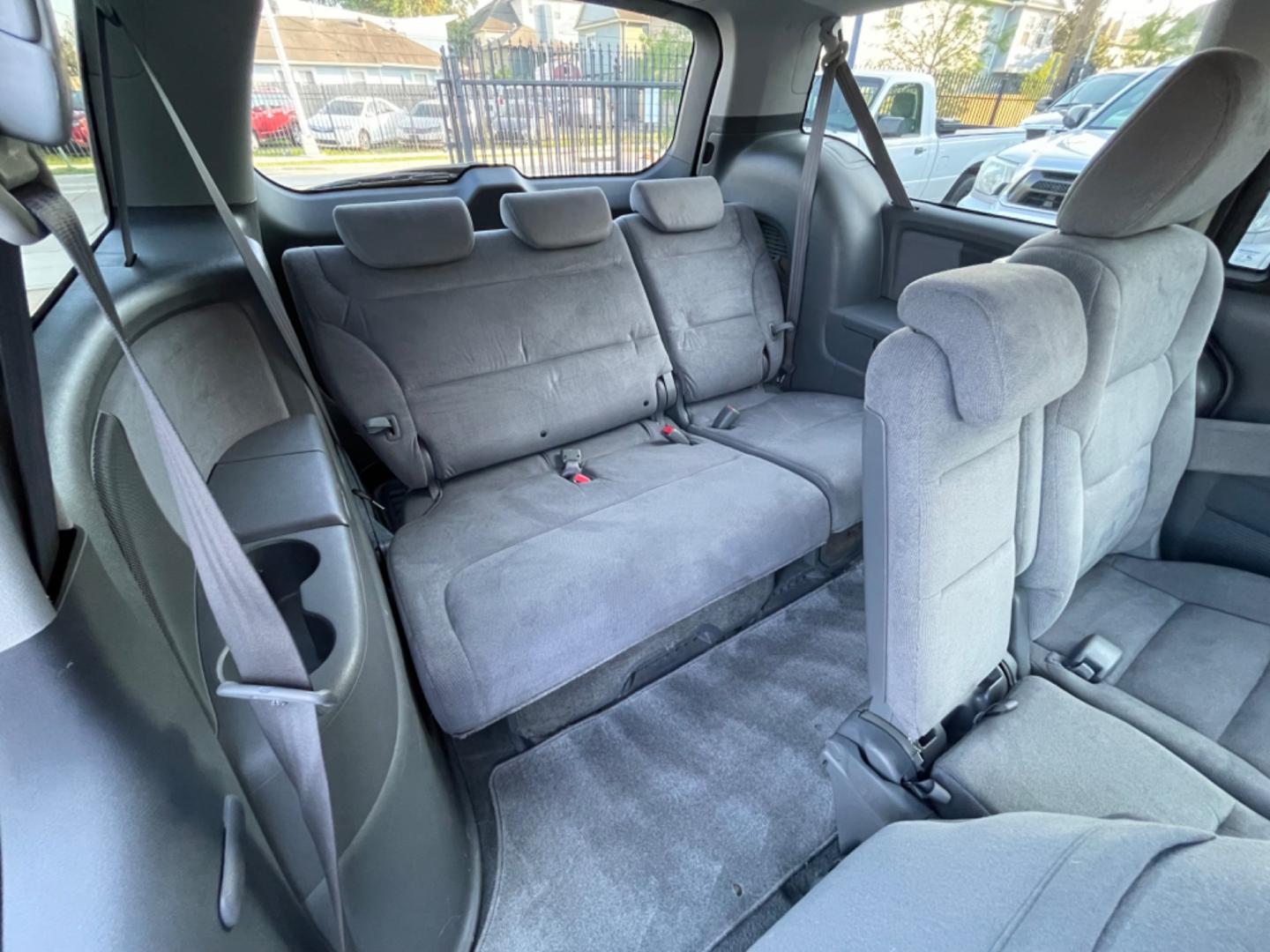 2007 Blue /Silver Honda Odyssey EX (5FNRL38457B) with an 3.5L V6 SOHC 24V engine, 5-Speed Automatic Overdrive transmission, located at 1501 West 15th St., Houston, 77008, (713) 869-2925, 29.797941, -95.411789 - Photo#9